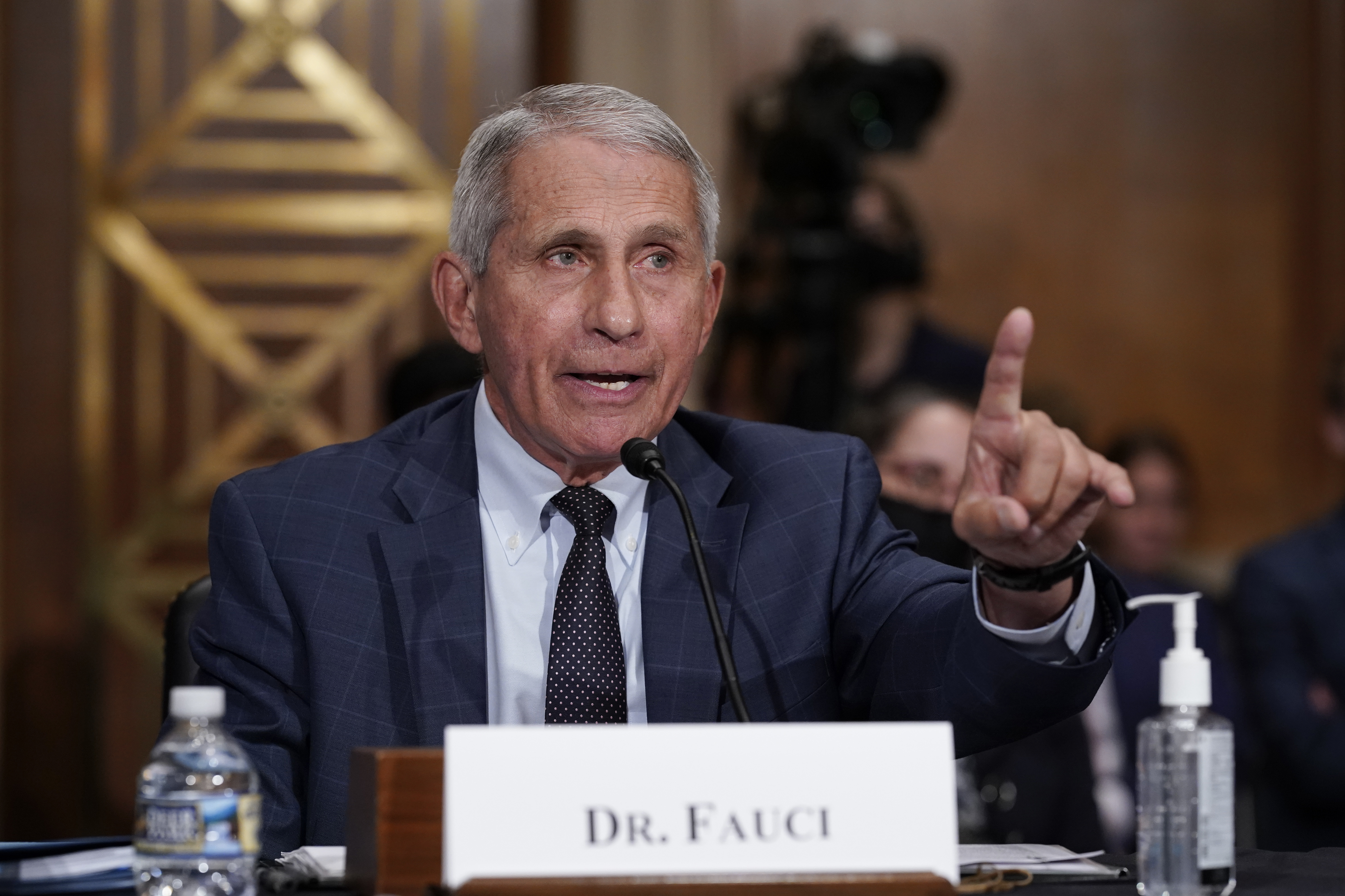 Top infectious disease expert Dr. Anthony Fauci responds to accusations by Sen. Rand Paul, R-Ky., as he testifies before the Senate Health, Education, Labor, and Pensions Committee, on Capitol Hill in Washington, Tuesday, July 20, 2021. Cases of COVID-19 have tripled over the past three weeks, and hospitalizations and deaths are rising among unvaccinated people.