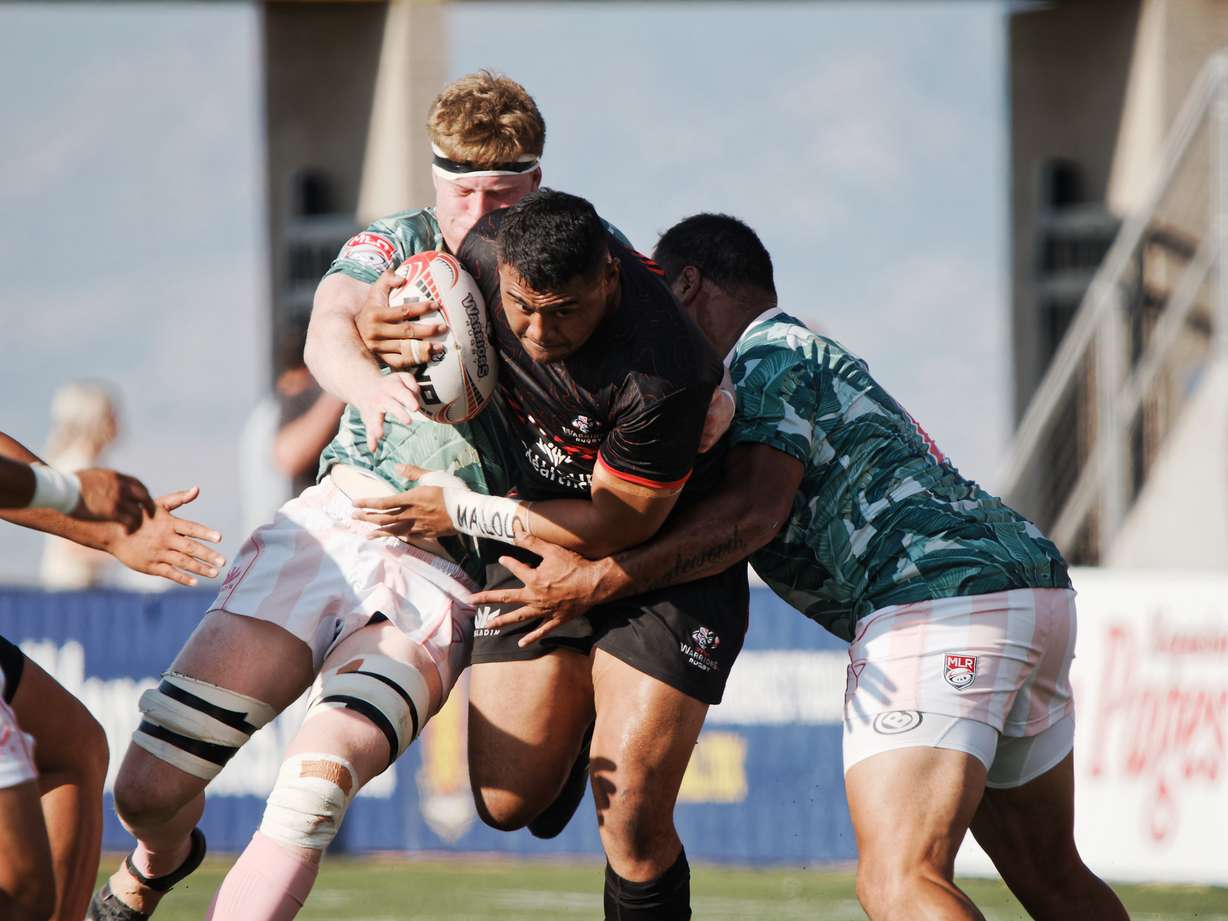 Utah Warriors hooker Sama Malolo squeezes through two Giltinis defenders during a Major League Rugby match, July 17, 2021 at Zions Bank Stadium in Herriman. Malolo had a try for the third consecutive week Sunday in the Western Conference finals.