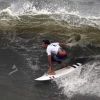 Pandemic Olympics endured heat, and now a typhoon's en route