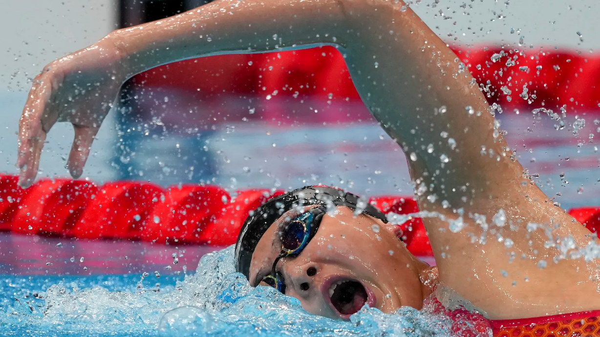 Wang Jianjiahe, of China, swims in her heat of the women’s 1500m freestyle at the 2020 Summer Olympics, Monday, July 26, 2021, in Tokyo, Japan.