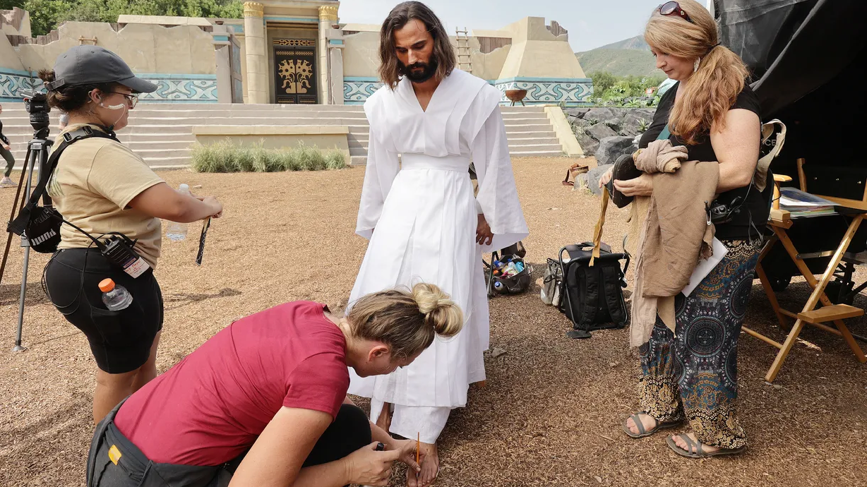 Extras try to stay hydrated as The Church of Jesus Christ of Latter-day Saints’ production of the fourth season of Book of Mormon videos is filmed near Springville on Monday.