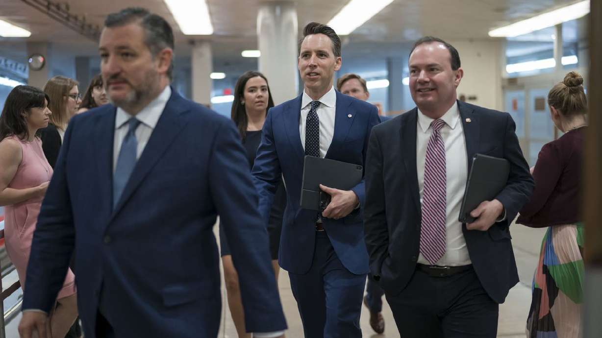 Sen. Ted Cruz, R-Texas, from left, Sen. Josh Hawley, R-Mo., and Sen. Mike Lee, R-Utah, arrive at the Senate chamber for
votes ahead of the Memorial Day recess at the Capitol in Washington, Thursday, May 27. Three conservative Senate Republicans, including Sen. Lee, filed an amicus brief Monday asking the U.S. Supreme Court to overturn its landmark ruling that allows abortion.