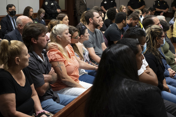 Friends and families of the victims listen during the plea hearing for spa shooting suspect Robert Aaron Long in Superior Court of Cherokee County in Canton, Ga. on Tuesday, July 27, 2021.