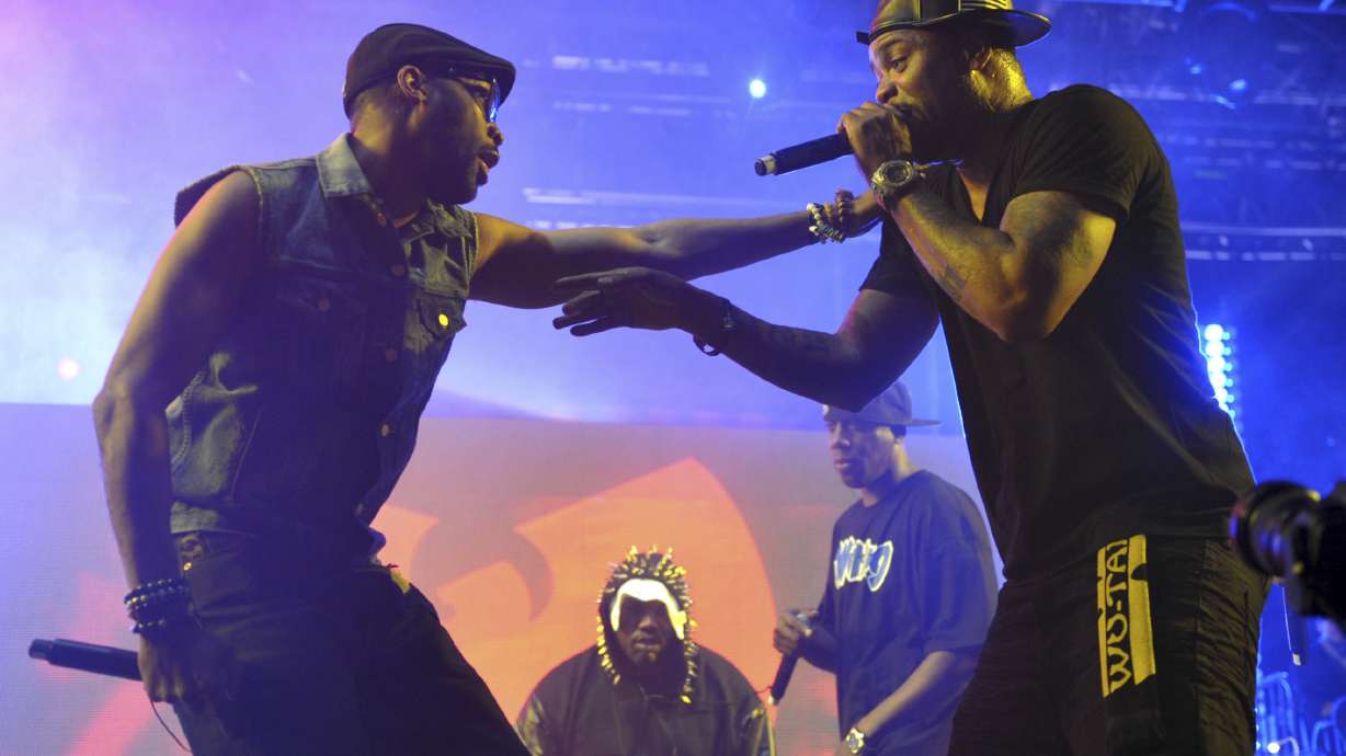 Robert Fitzgerald Diggs, aka RZA, left, and Clifford Smith, aka Method Man, of Wu-Tang Clan, right, perform at the second weekend of the 2013 Coachella Valley Music and Arts Festival in Indio, Calif. An unreleased Wu-Tang Clan album forfeited by Martin Shkreli after his securities fraud conviction was sold for an undisclosed sum, though prosecutors say it was enough to fully satisfy the rest of what he owed on a $7.4 million forfeiture order he faced after his 2018 sentencing.