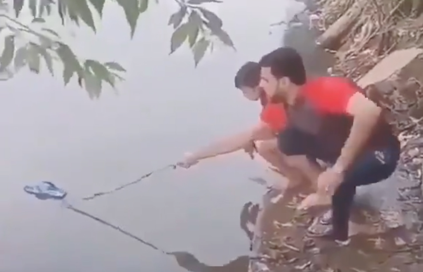 In this TikTok video, a man has loses his flip-flop in the water. He tries to retrieve it with a stick from the shore but can't quite do it. Sometimes the simplest solutions are so close, yet so far.