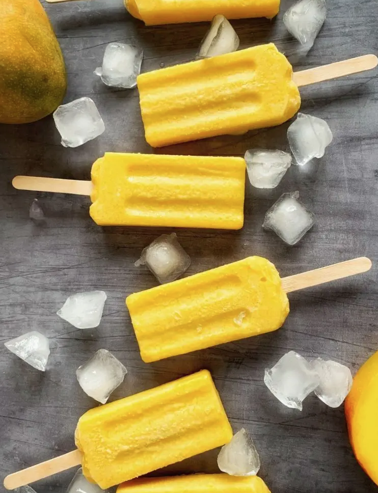 Creamy mango popsicles.