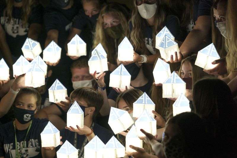 Utah State University students participate in the
annual Connections Luminary in Logan on Aug. 28, 2020.
