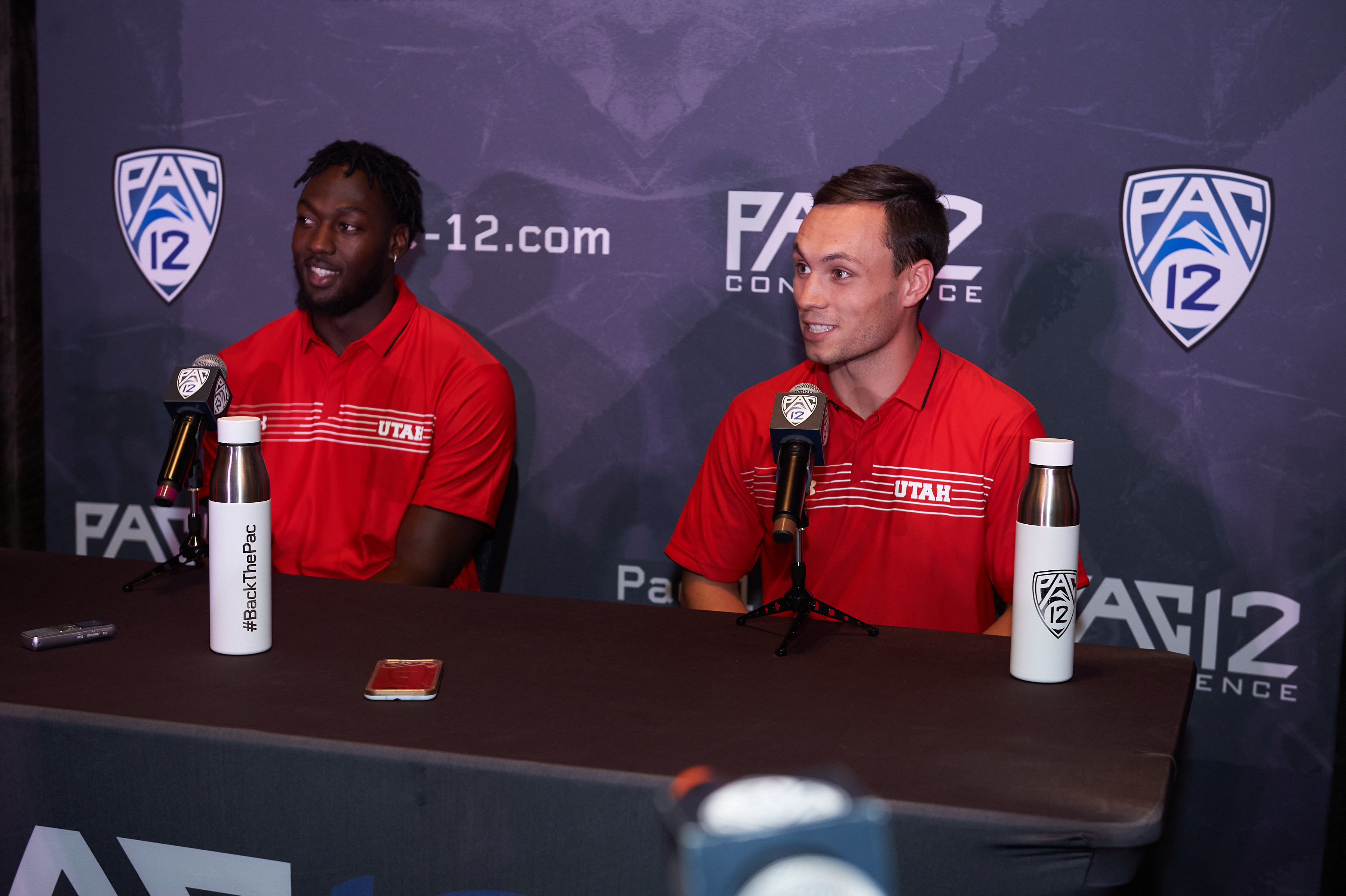 University of Utah receiver Britain Covey and linebacker Devin Lloyd talk to media as part of the Pac-12's media day in Hollywood, California on July 27, 2021.