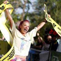 Top female finisher of Deseret News Marathon motivated by unique tribute to dad