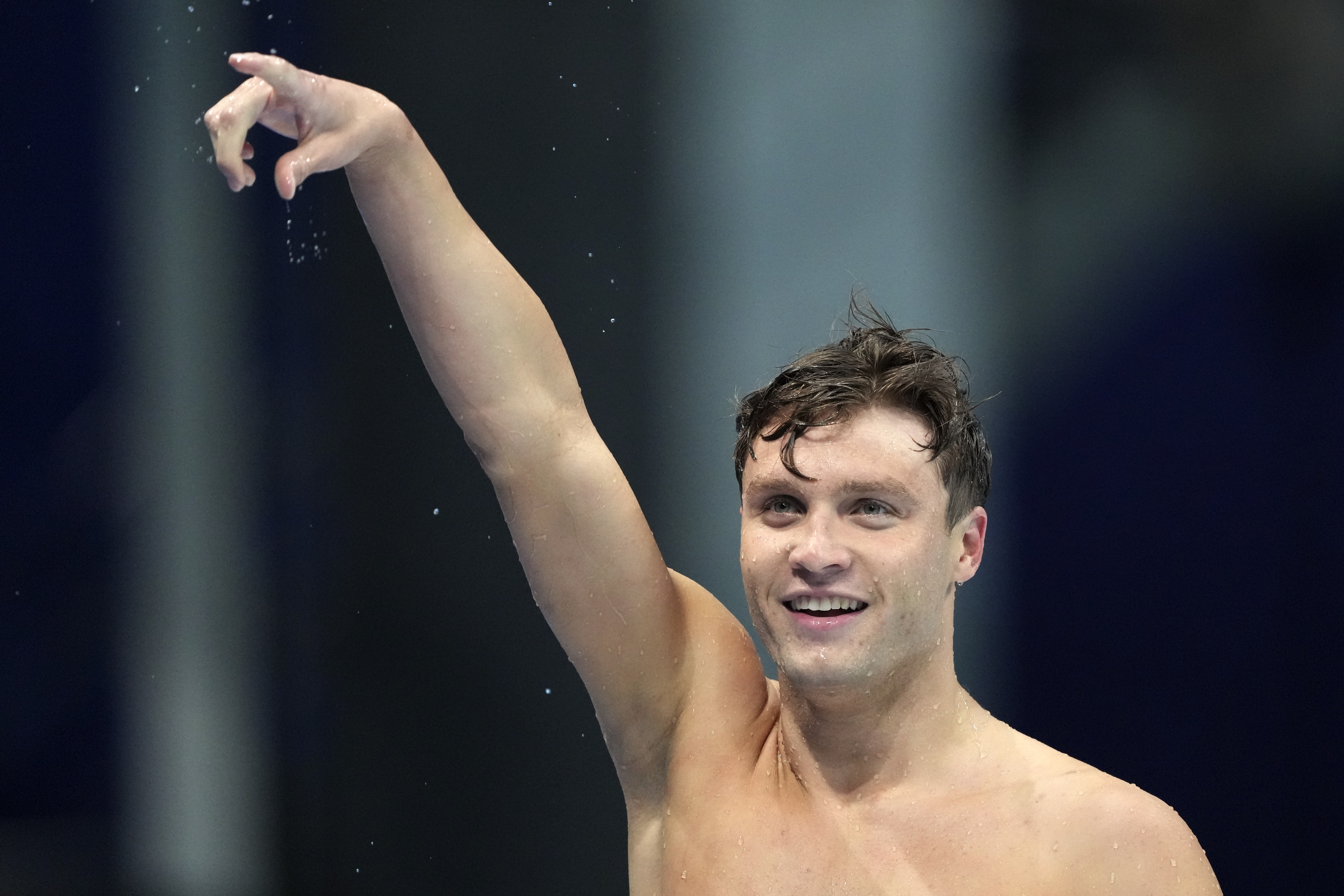 Robert Finke of the United States celebrates winning the men's 800-meters freestyle final at the 2020 Summer Olympics, Thursday, July 29, 2021, in Tokyo, Japan. 