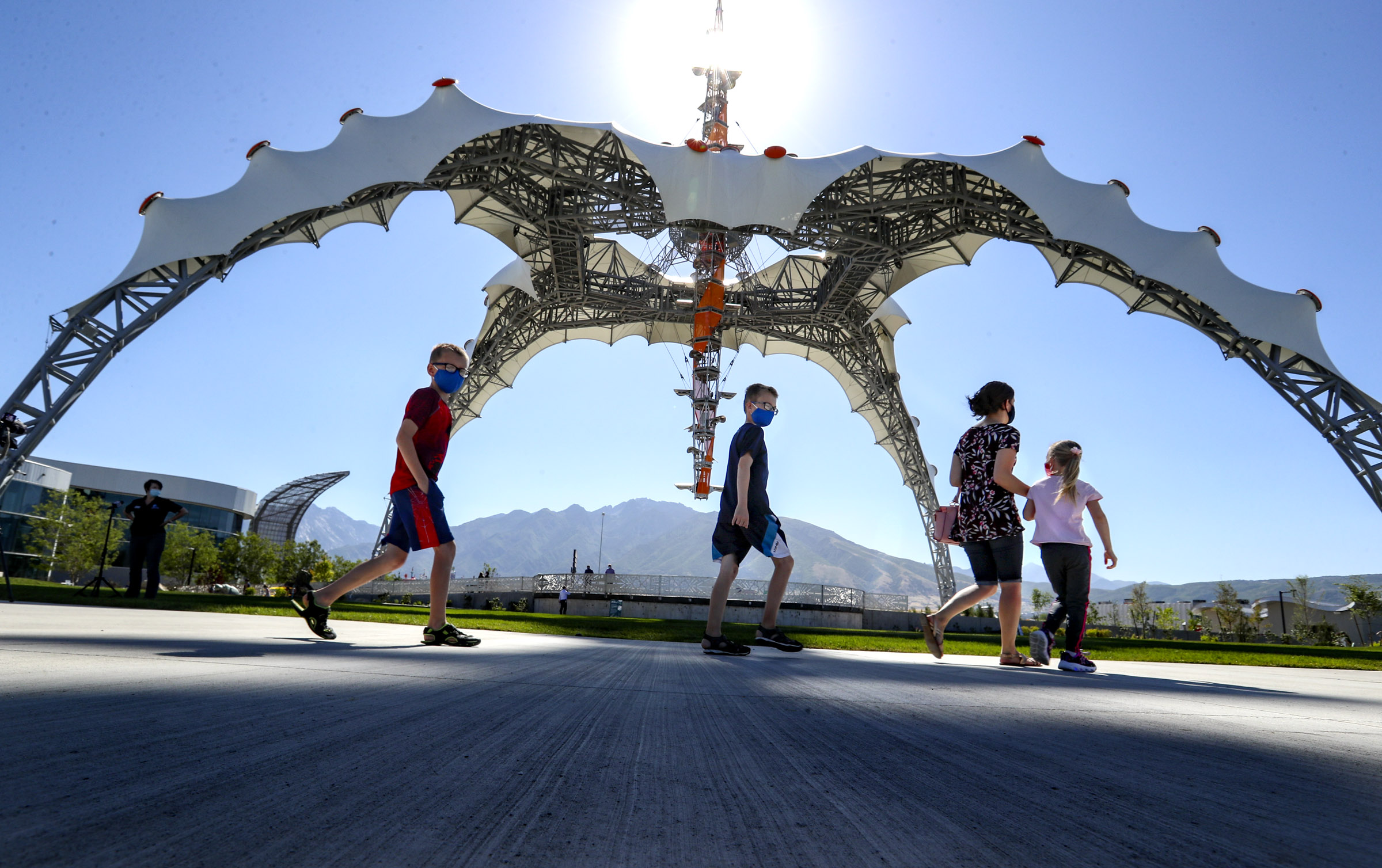 Sher Stine and her children, Jack, left, Max and Ashlyn, check out the Loveland Living Planet Aquarium's Rio Tinto Kennecott Plaza in Draper on July 2, 2020. In 2022, the structure will serve as a metaphorical spaceship to transport guests to a variety of virtual worlds, including outer space.