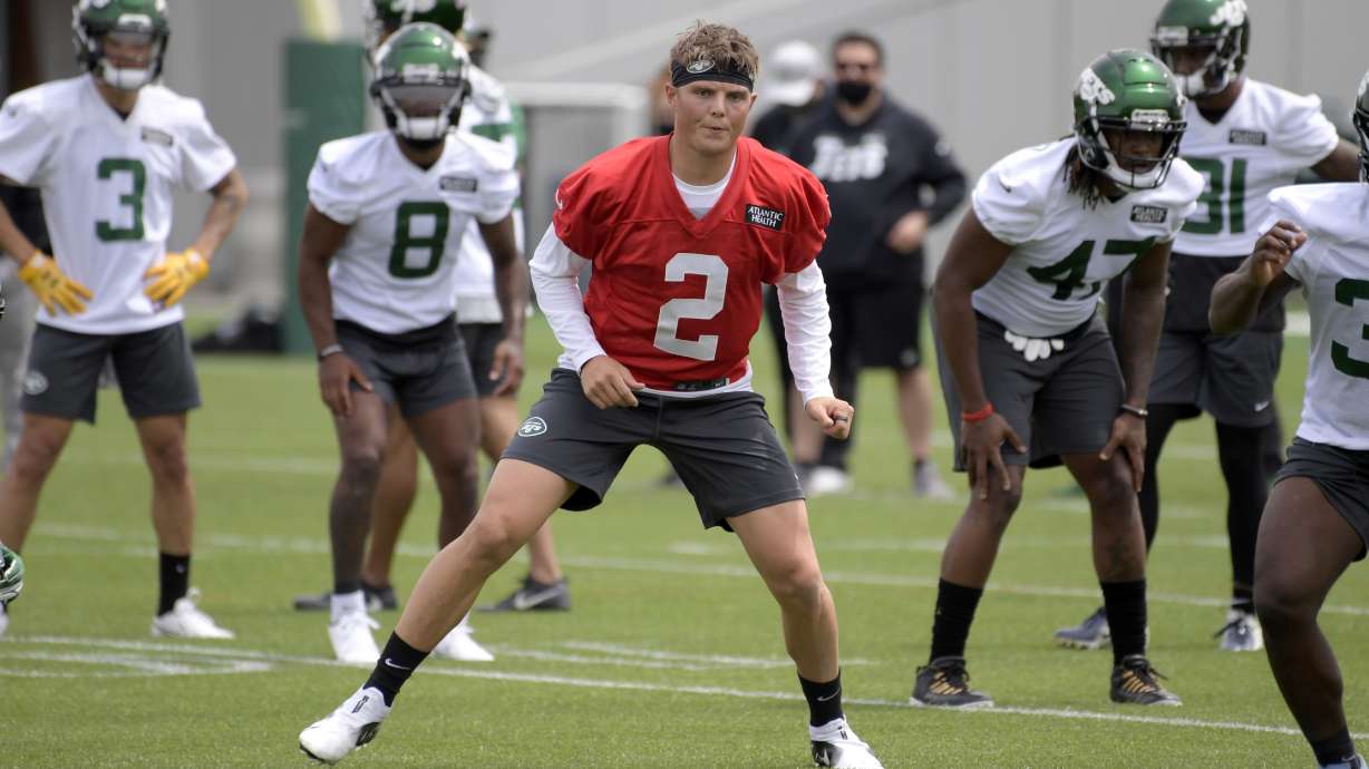 New York Jets first round draft pick Zach Wilson works out during NFL rookie camp in Florham Park, N.J., in this Friday, May 7, 2021. Wilson gets a fully guaranteed deal worth $35.15 million, including a signing bonus of $22.9 million, sources told the AP.