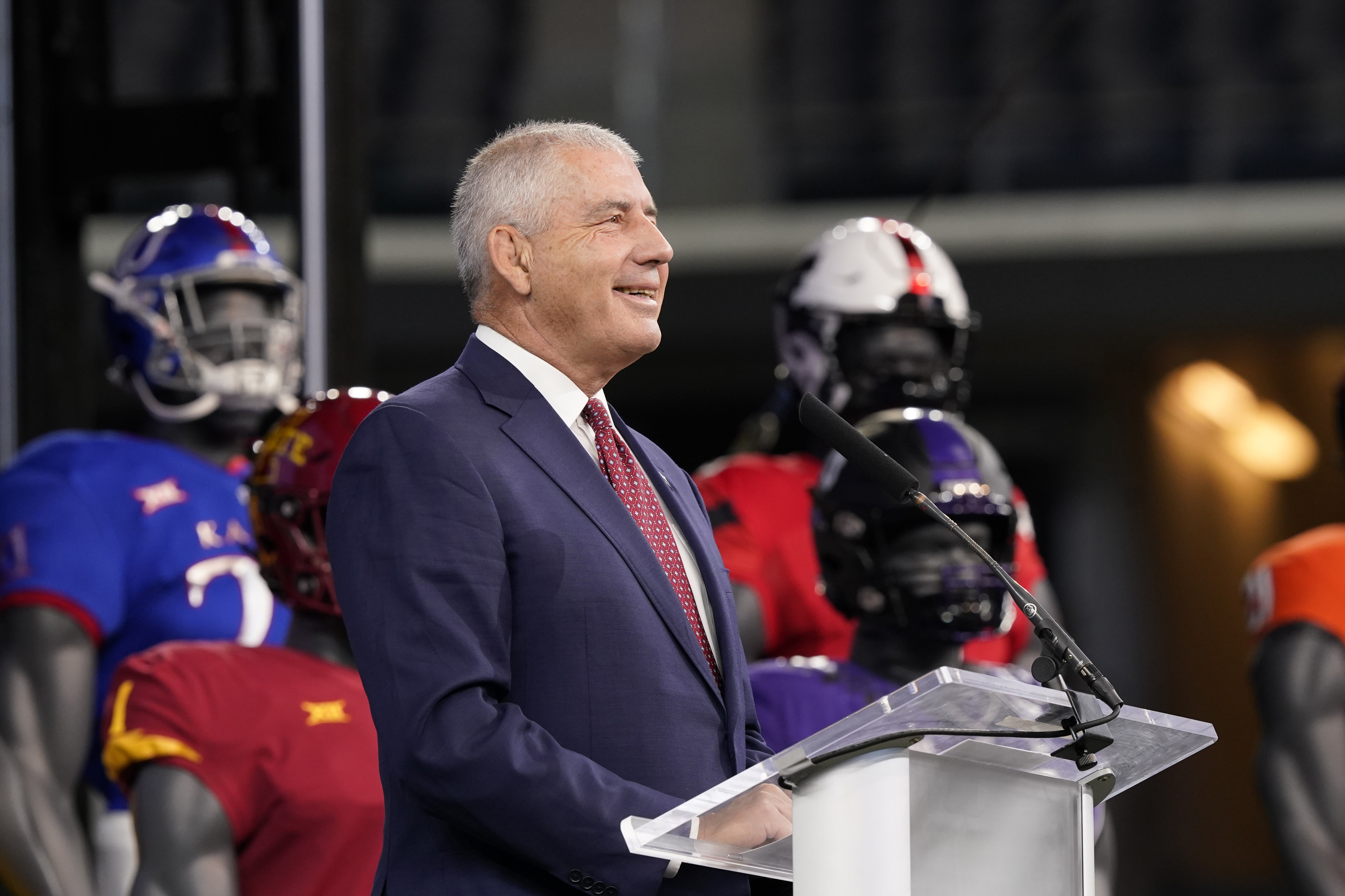 Big 12 commissioner Bob Bowlsby smiles as he listens to a question during NCAA college football Big 12 media days Wednesday, July 14, 2021, in Arlington, Texas. Bowlsby announced last week that he will be stepping down as commissioner of the Big 12.