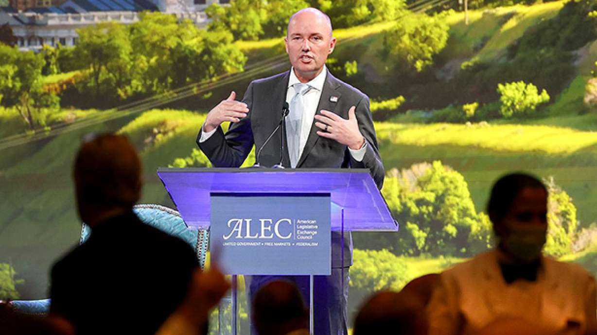 Gov. Spencer Cox speaks during the American Legislative
Exchange Council (ALEC) conference as the crowd talks over him and
eats lunch at the Grand America Hotel in Salt Lake City on
Thursday, July 29, 2021.