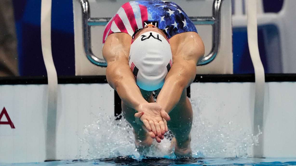Rhyan Elizabeth White of the United States starts in her heat of the women's 200-meter backstroke at the 2020 Summer Olympics, Thursday, July 29, 2021, in Tokyo, Japan.