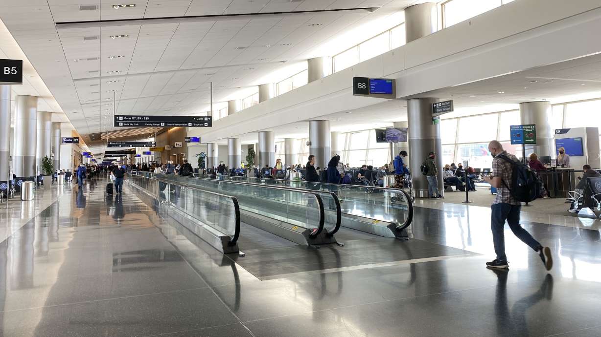 Travelers walk through Salt Lake City International Airport in Salt Lake City on May 3. Airport officials say they plan to add 19 business units as a part of the second phase of the airport's construction.