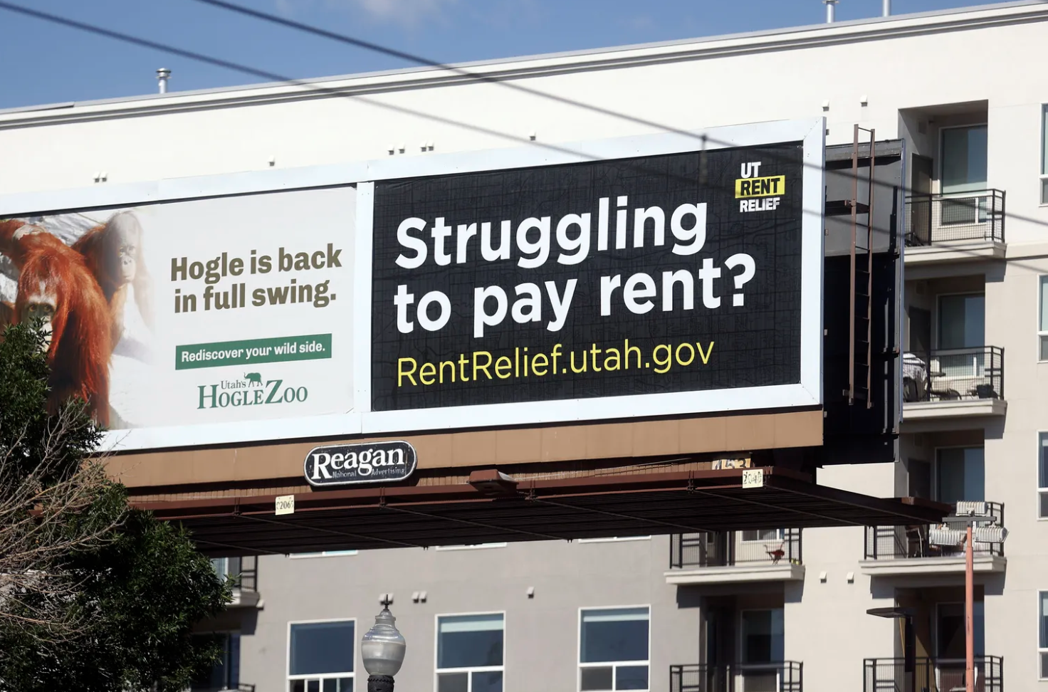 A billboard for RentRelief.utah.gov is pictured on 400 South in Salt Lake City on Thursday, June 3, 2021. As Congress scrambles in an eleventh-hour push to extend the nationwide eviction moratorium set to expire Saturday, billions already approved for housing aid across the country remain untouched.