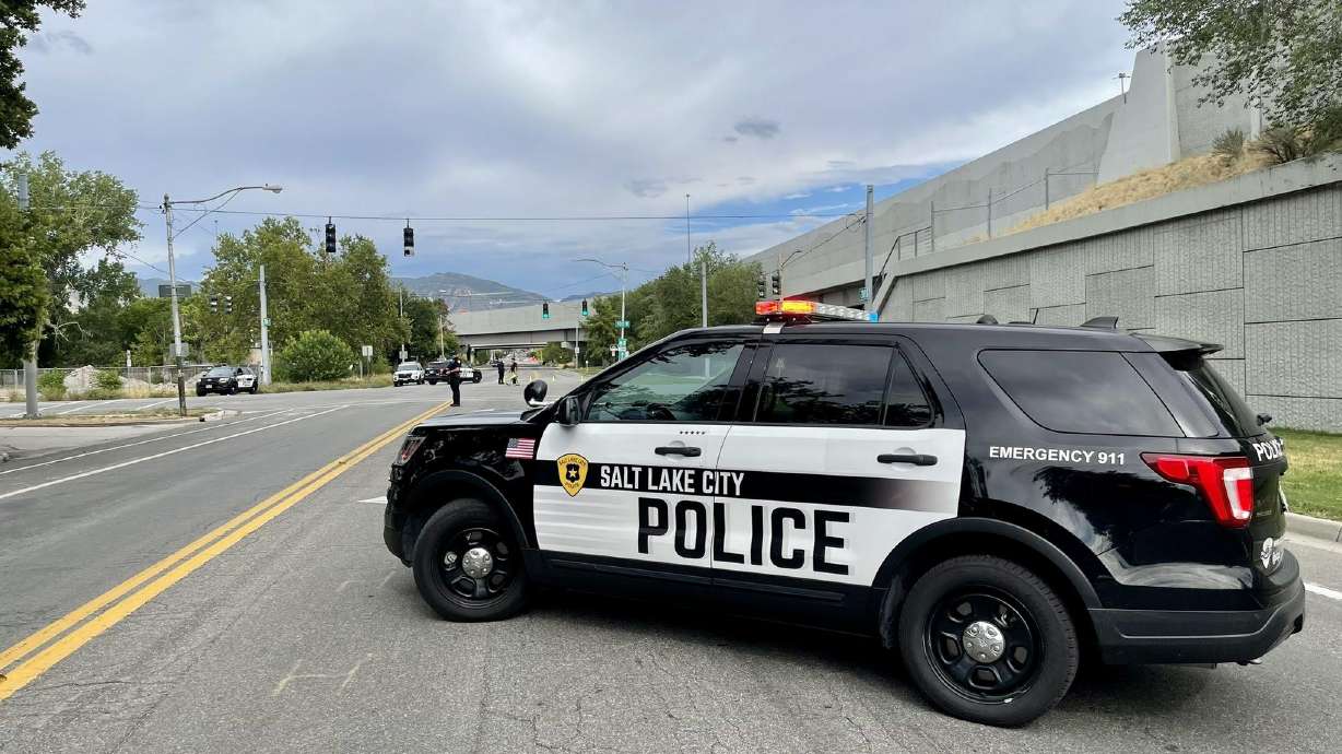 A man who police say tried to break into a Salt Lake apartment with an ax Tuesday was arrested in connection with a stabbing over the weekend at Pioneer Park.
