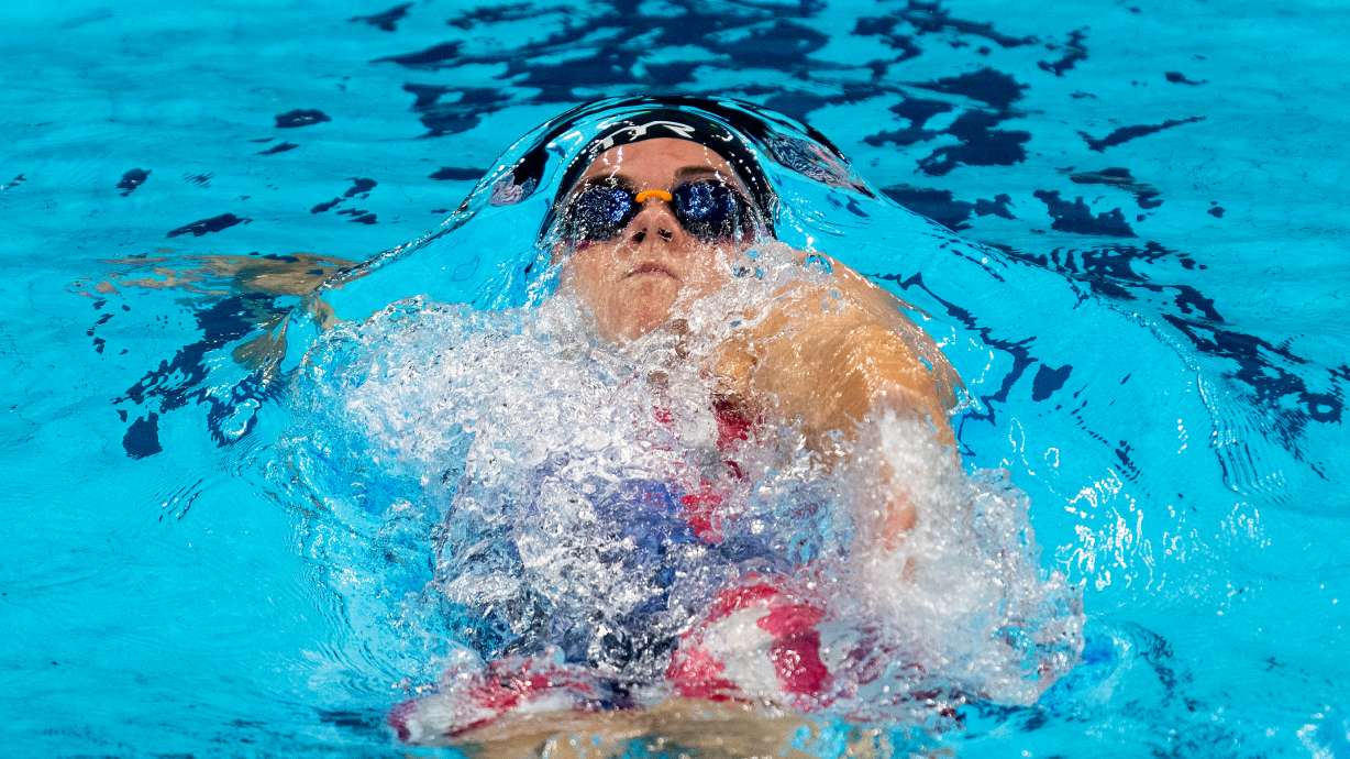 United States' Rhyan White swims in a women's 4x100-meter medley relay heat at the 2020 Summer Olympics, Friday, July 30, 2021, in Tokyo, Japan.