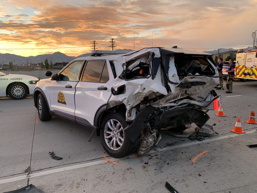 A Utah Highway Patrol sergeant and several other people were hospitalized after a crash on I-215 on Sunday.