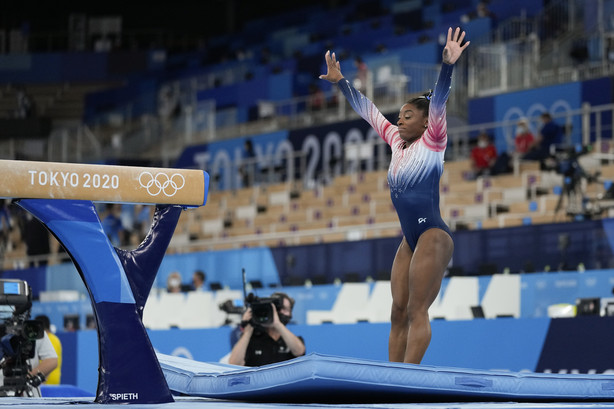 Simone Biles, of the United States, warms up prior to the artistic gymnastics balance beam final at the 2020 Summer Olympics, Tuesday in Tokyo, Japan.