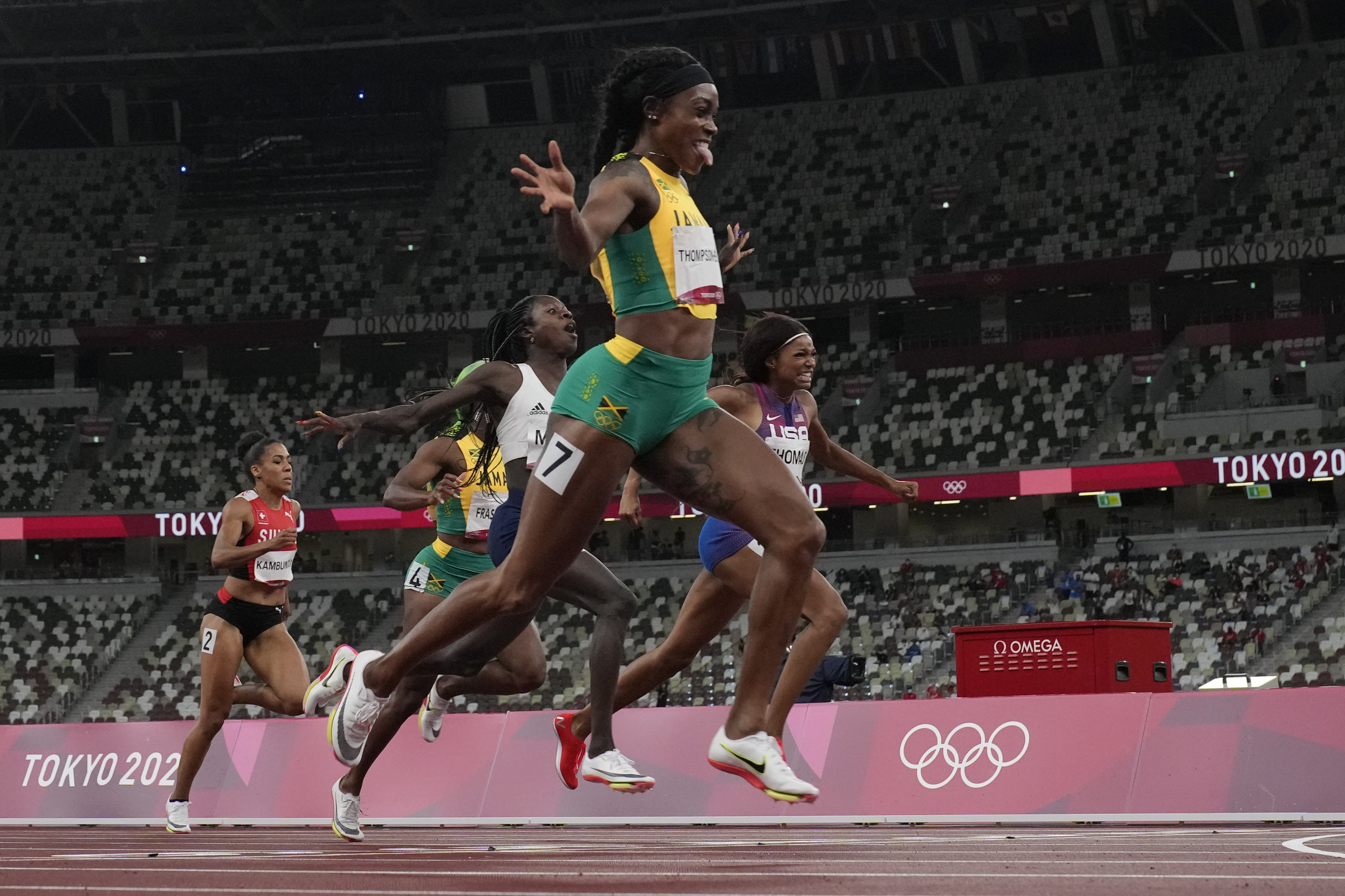 Elaine Thompson-Herah, of Jamaica, wins the final of the women's 200-meters at the 2020 Summer Olympics, Tuesday, Aug. 3, 2021, in Tokyo. 