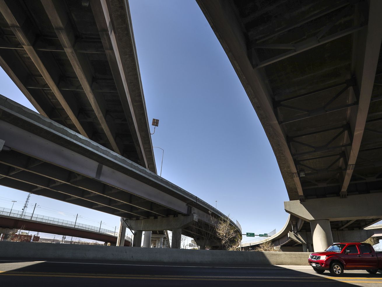 The I-80 and I-15 interchange overpasses cross over 600 West in South Salt Lake on Wednesday, April 7, 2021.