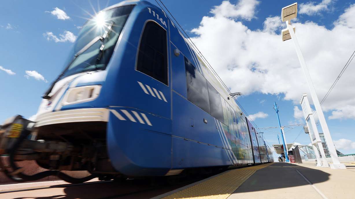 A TRAX train moves through Salt Lake City on April 4, 2017. The Red Line TRAX route in South Jordan is out of service on Wednesday after a dump truck hit power lines in the area.