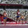 McLaughlin outsprints teammate Muhammad for hurdles record