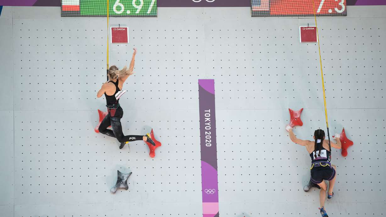 Aleksandra Miroslaw of Poland and Kyra Condie of the USA at the Tokyo 2020 women's combined in the debut of sport climbing.