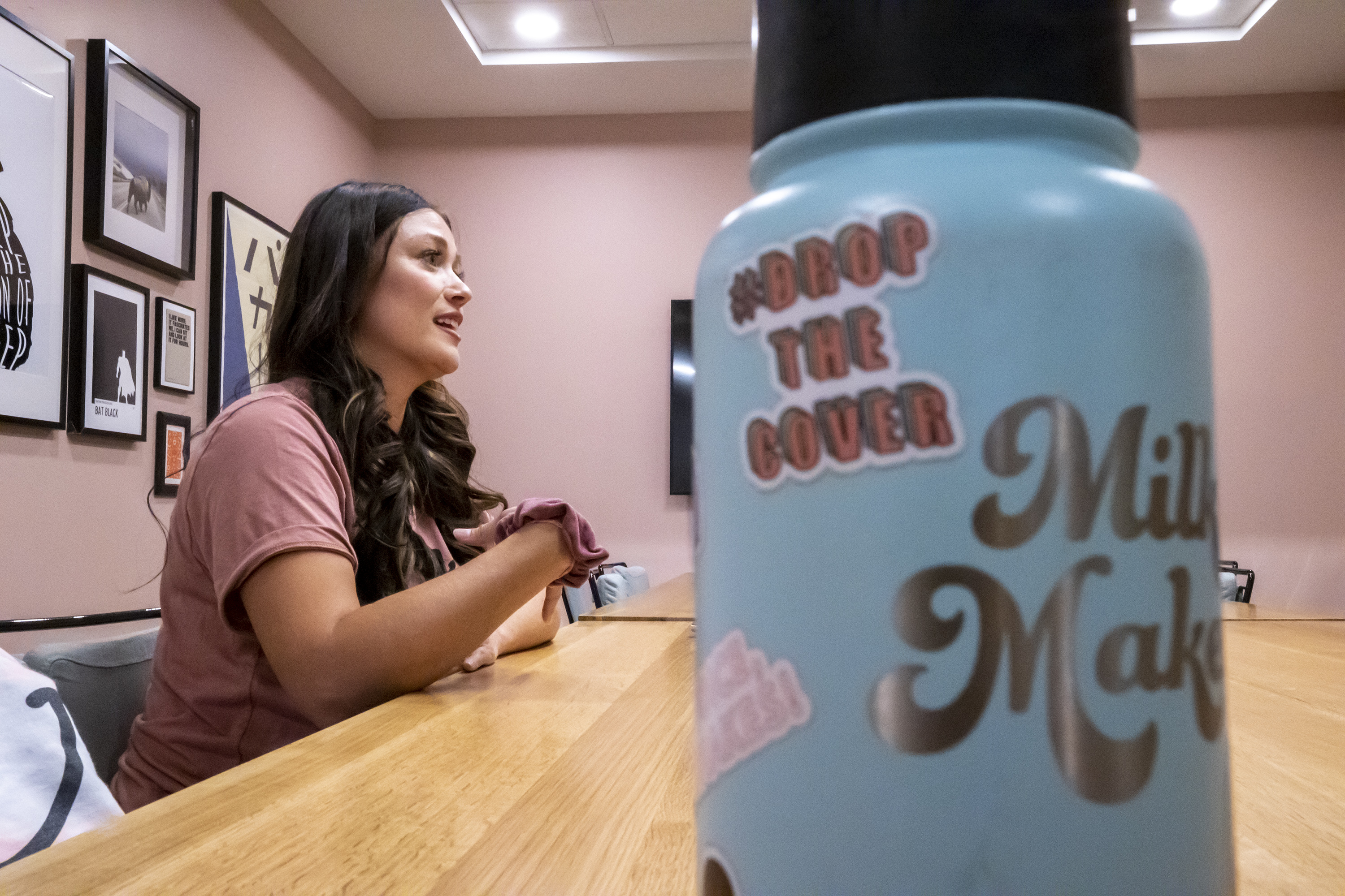 Lindsay White, who created The Little Milk Bar, a breastfeeding brand to empower mothers to be able to breastfeed wherever they need to without shame, talks about the launch of #DroptheCover at Kiln, a co-working space in Lehi, on Tuesday, Aug. 3, 2021. White launched the #DroptheCover movement to show that breastfeeding mothers don't have to use a cover if they don't want to.