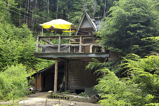 This undated photo shows the shack that David Lidstone, 81, has built and lived in for nearly three decades in the woods of Canterbury, N.H., growing his own food and cutting his firewood. He's now jailed after not complying with a court order to leave, and there's a growing petition to just let "River Dave" live out his days off the grid.