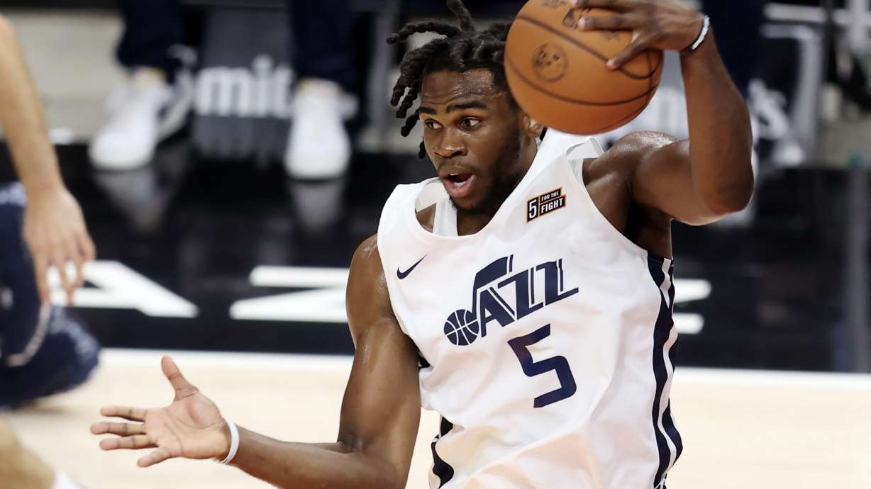 Utah Jazz's Jarell Brantley of the White team, snags a rebound as they play Memphis in summer league action at Vivint Smart Home Arena in Salt Lake City on Wednesday, Aug. 4, 2021.