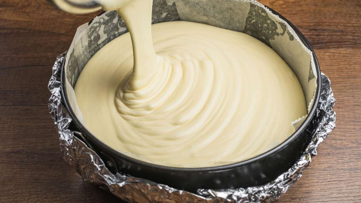 The CDC warns people not to eat raw cake batter because it can contain harmful bacteria that are only killed during cooking.