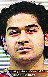 Booking image of Lolo Latu, who was 16 at the time.