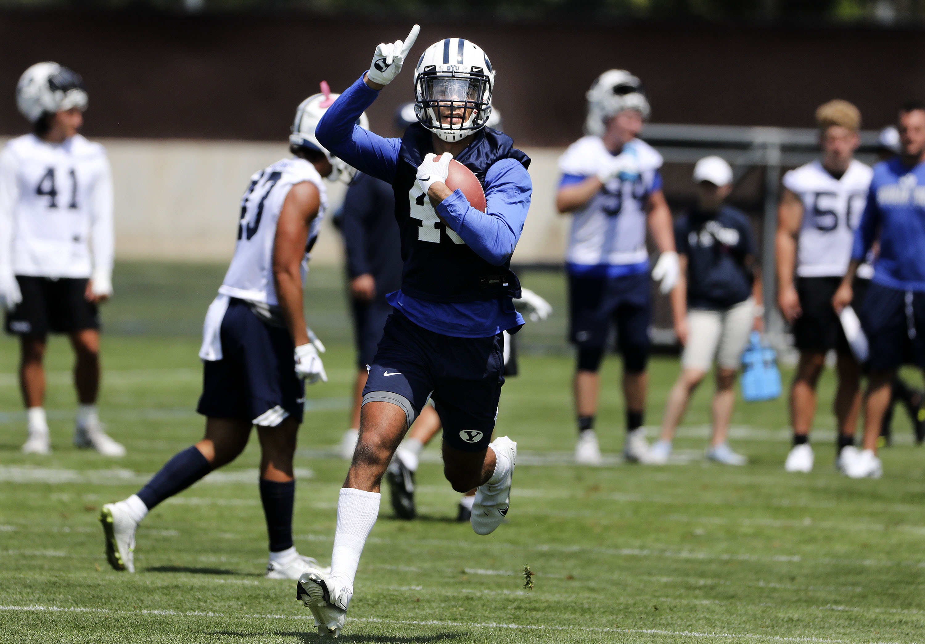 BYU's Samson Nacua gestures after catching a pass during practice in Provo on Thursday, Aug. 5, 2021.