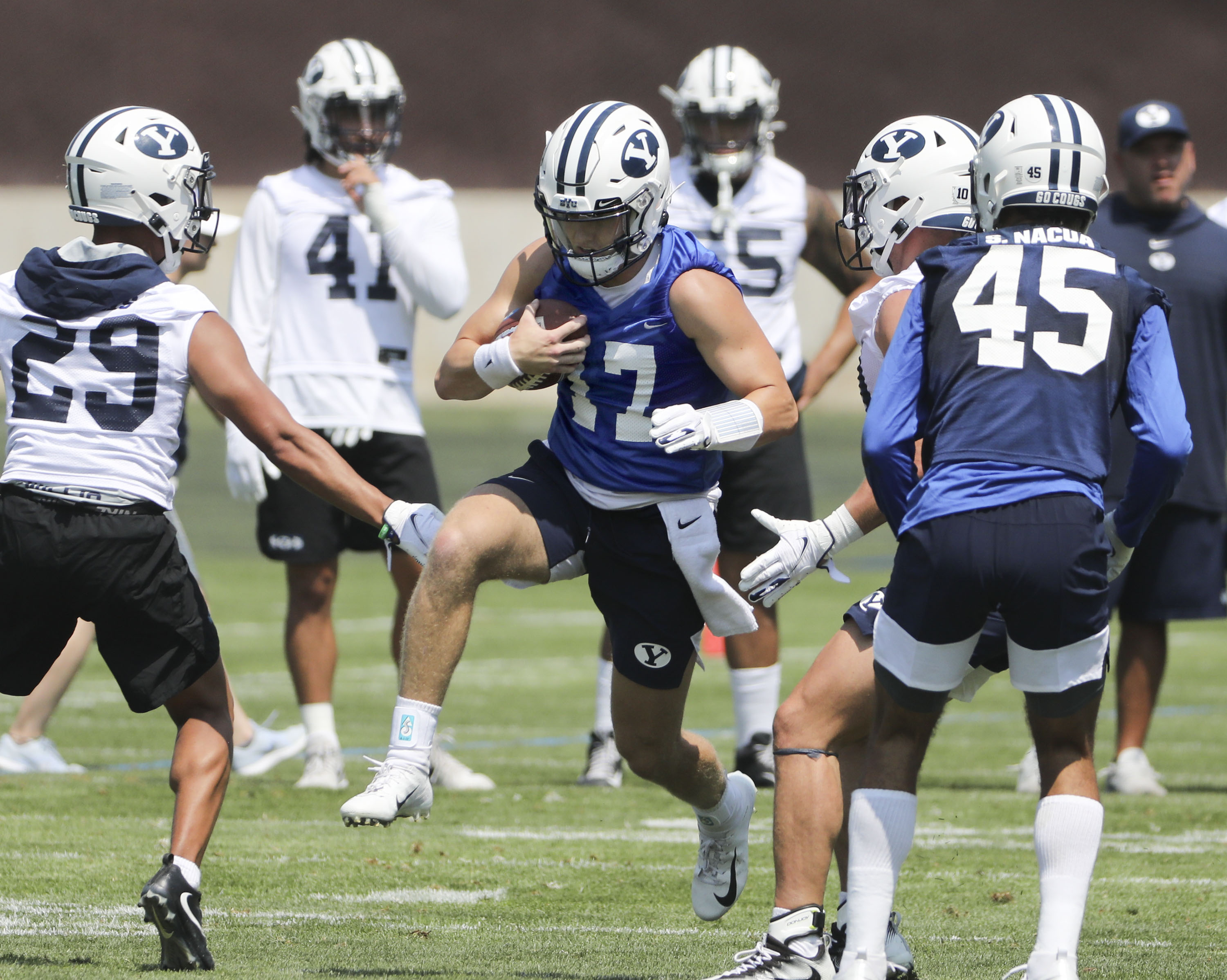 BYU's Jacob Conover runs the ball during practice in Provo on Thursday, Aug. 5, 2021.