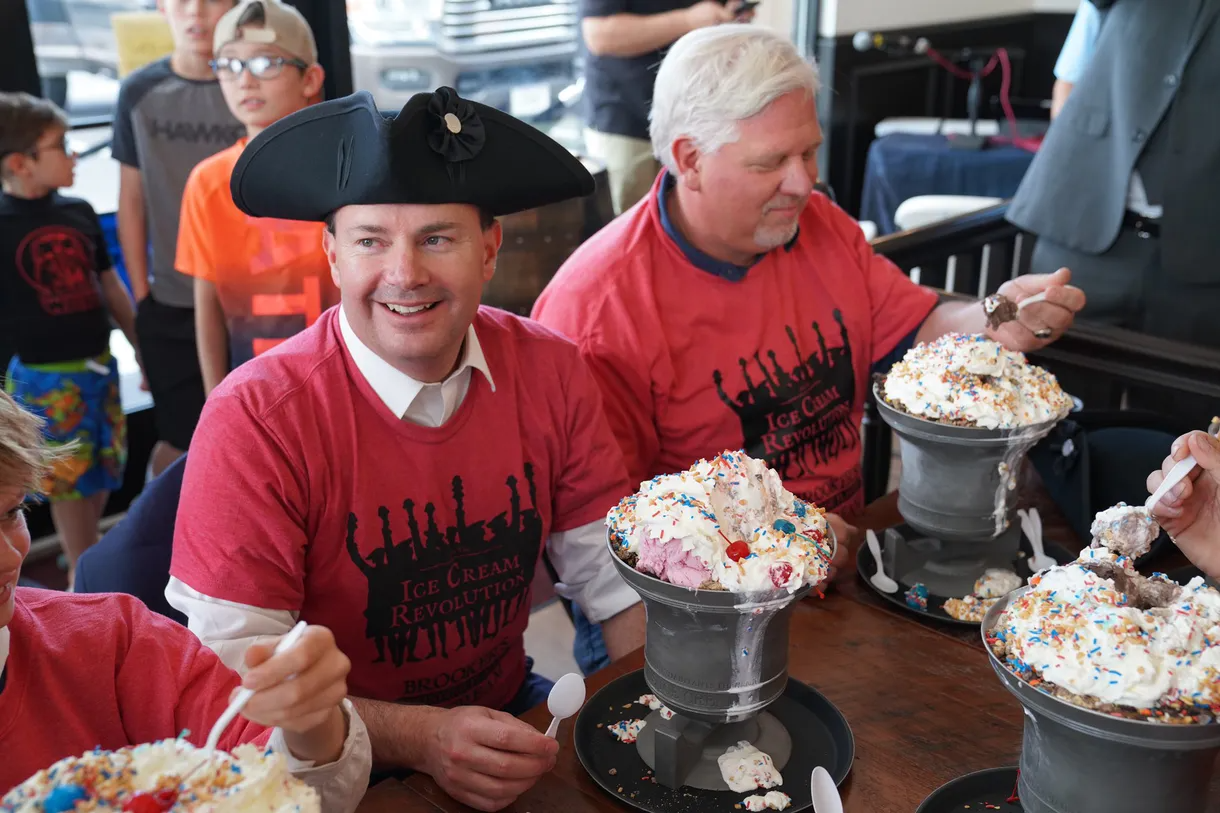 Sen. Mike Lee, left, and Glenn Beck participate in the Liberty Bell Monumental Sundae launch party at Brooker’s Founding Flavors Ice Cream in Herriman on June 25, 2021. 