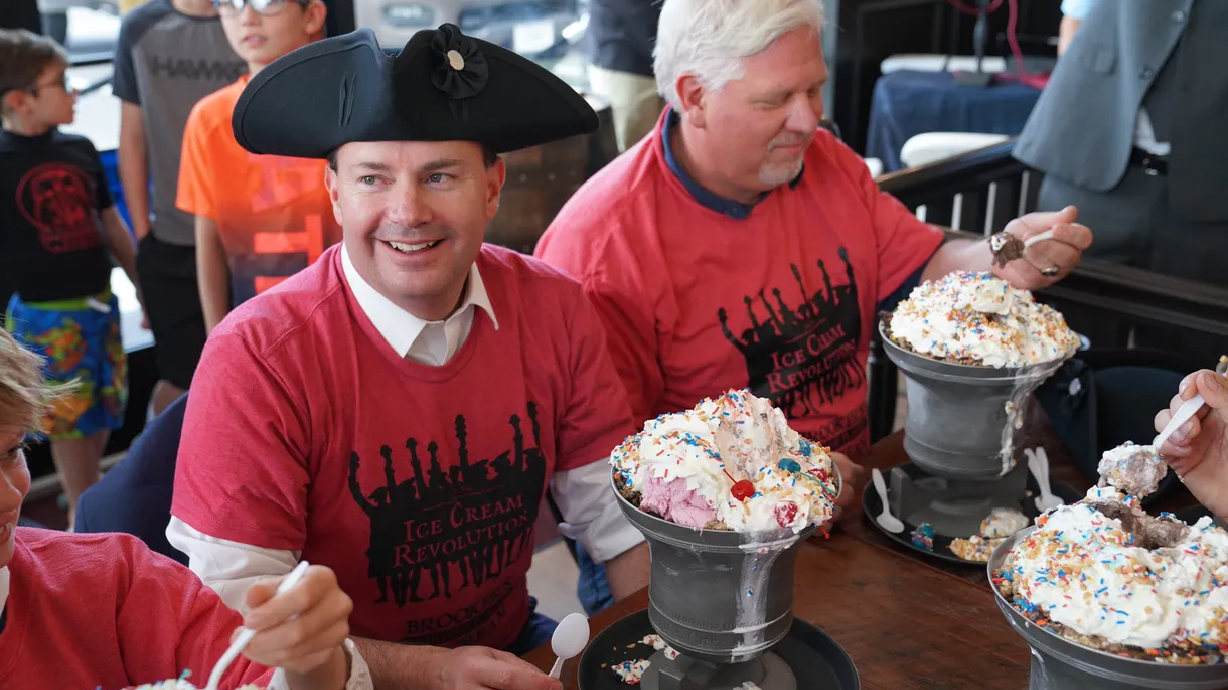 Sen. Mike Lee, left, and Glenn Beck participate in the Liberty Bell Monumental Sundae launch party at Brooker’s Founding Flavors Ice Cream in Herriman on June 25, 2021.