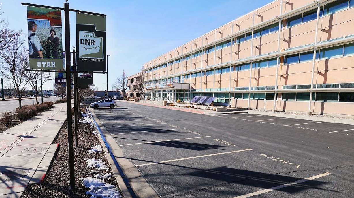 The parking lot at the Utah Department of Natural Resources in Salt Lake City is nearly empty on Feb. 22. A massive, global shift to remote work wrought by COVID-19 restrictions made indelible changes to the workplace dynamic. Now some leaders are ready to levy wage reductions or other penalties against those who would prefer to continue working from home.