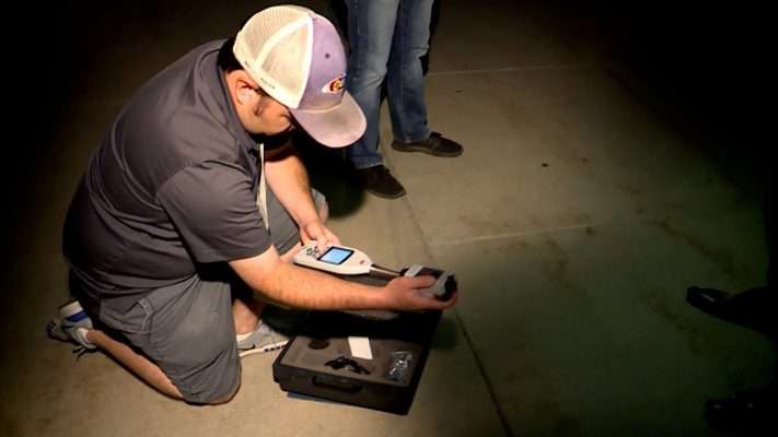 Cooper MacCourtney, an environmental health scientist with the Salt Lake County Health Department, prepares his decibel reader.