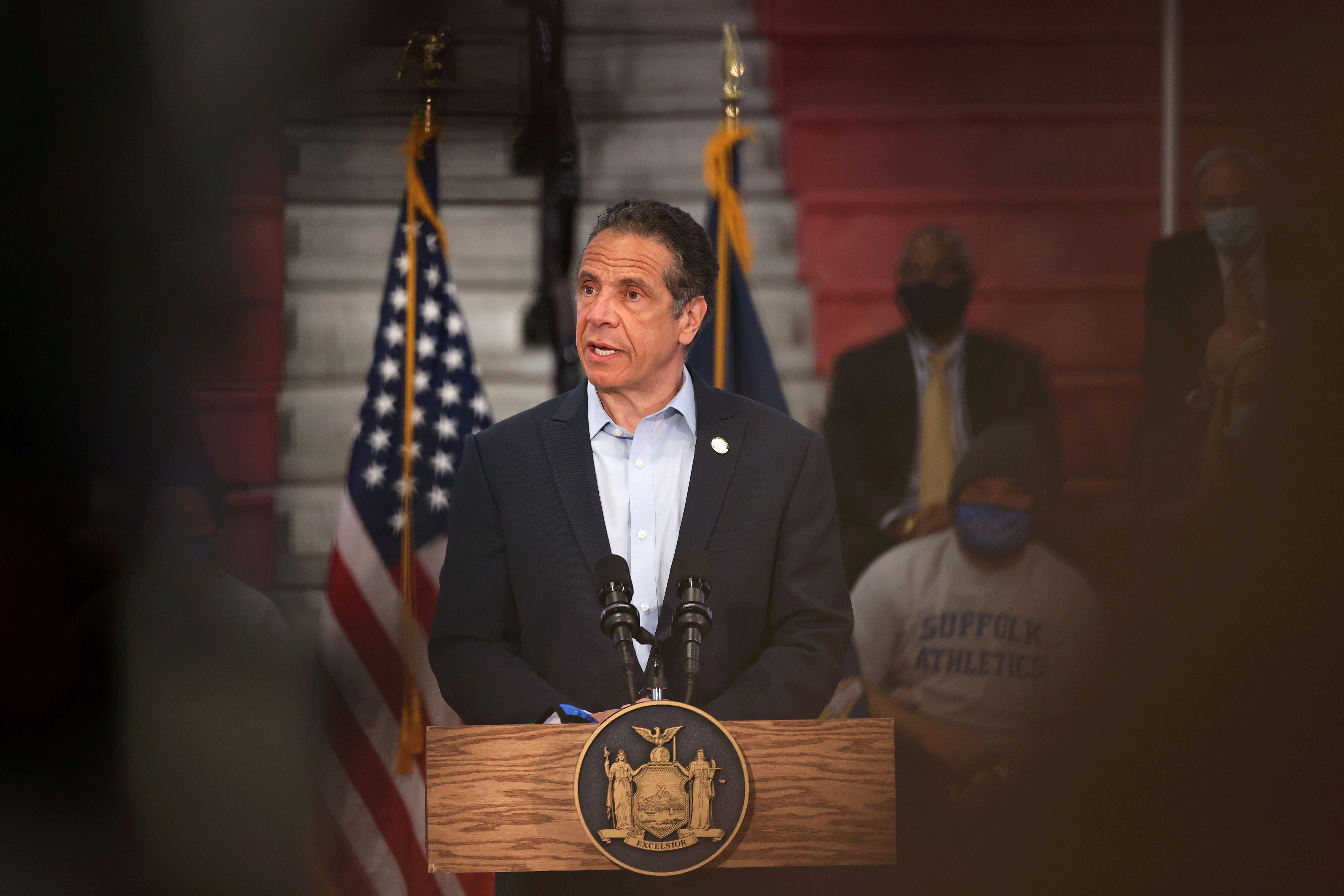 New York Gov. Andrew Cuomo speaks during a news conference on COVID-19 vaccination in Brentwood, New York, in April 2021. A former employee who accused Cuomo of groping her in the Executive Mansion in Albany has filed a criminal complaint with the Albany County Sheriff's Office, the agency said on Friday.

