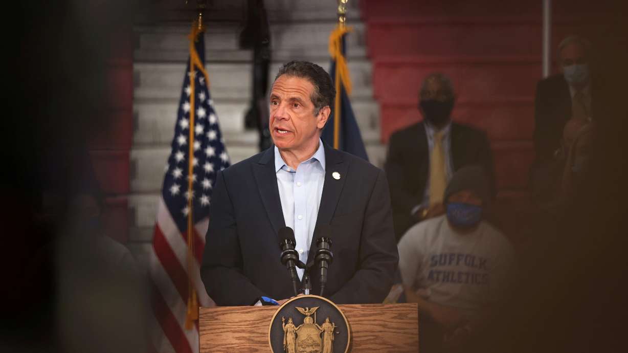 New York Gov. Andrew Cuomo speaks during a news conference on COVID-19 vaccination in Brentwood, New York, in April 2021. A former employee who accused Cuomo of groping her in the Executive Mansion in Albany has filed a criminal complaint with the Albany County Sheriff's Office, the agency said on Friday.