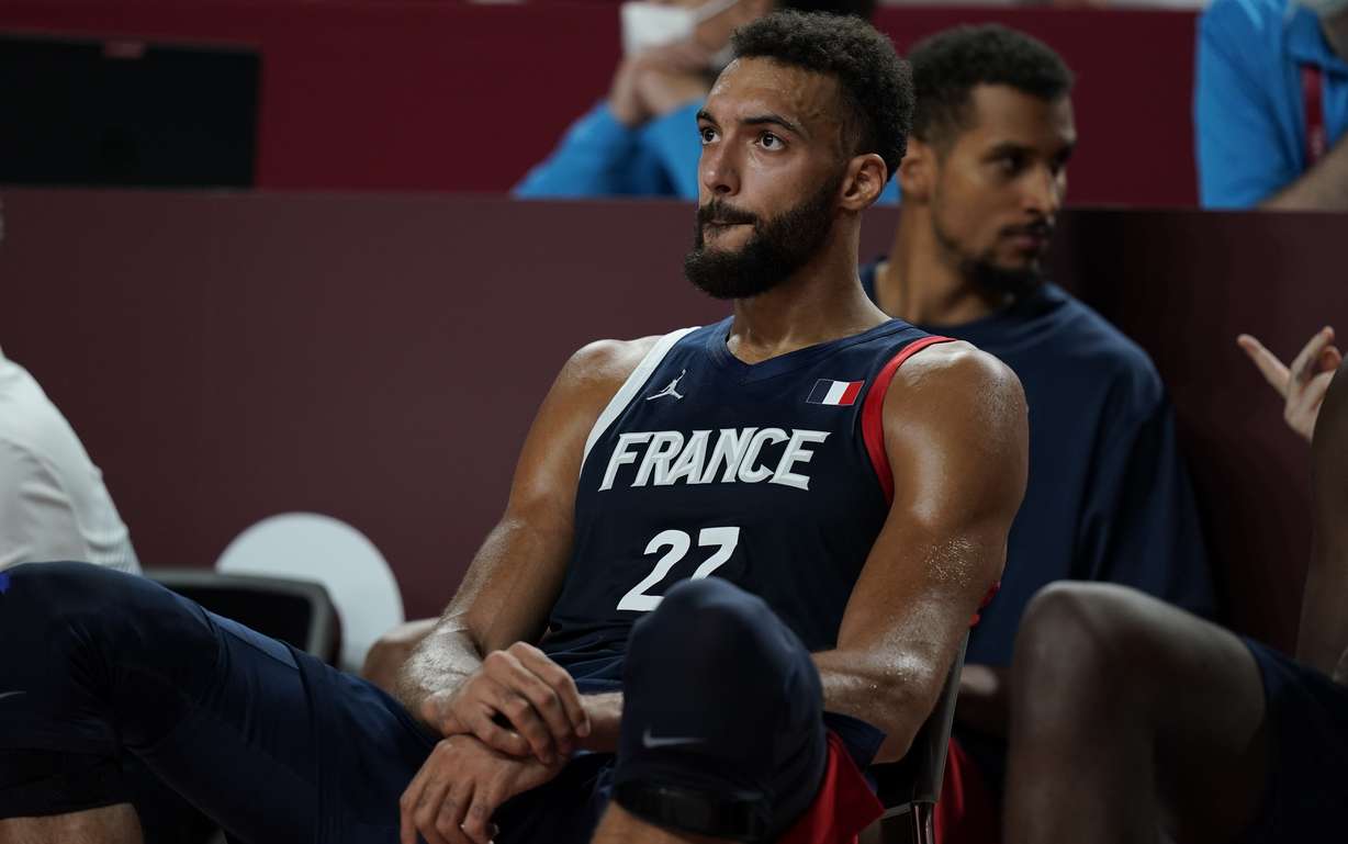 France's Rudy Gobert (27) reacts after their loss in the men's basketball gold medal game against the United States at the 2020 Summer Olympics, Saturday, Aug. 7, 2021, in Saitama, Japan.