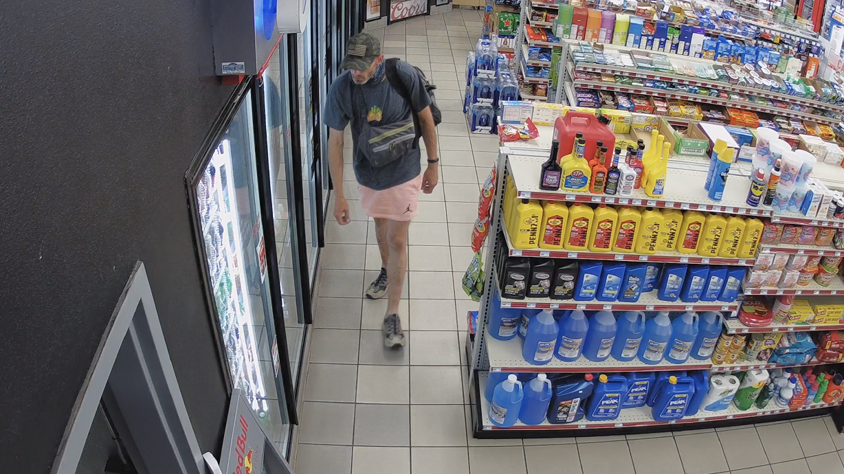 Murray police say this man barricaded himself in a gas station Sunday after attempting to carjack a woman in a nearby parking lot at gunpoint. Russell Ryan Carter, 44, was arrested Monday.