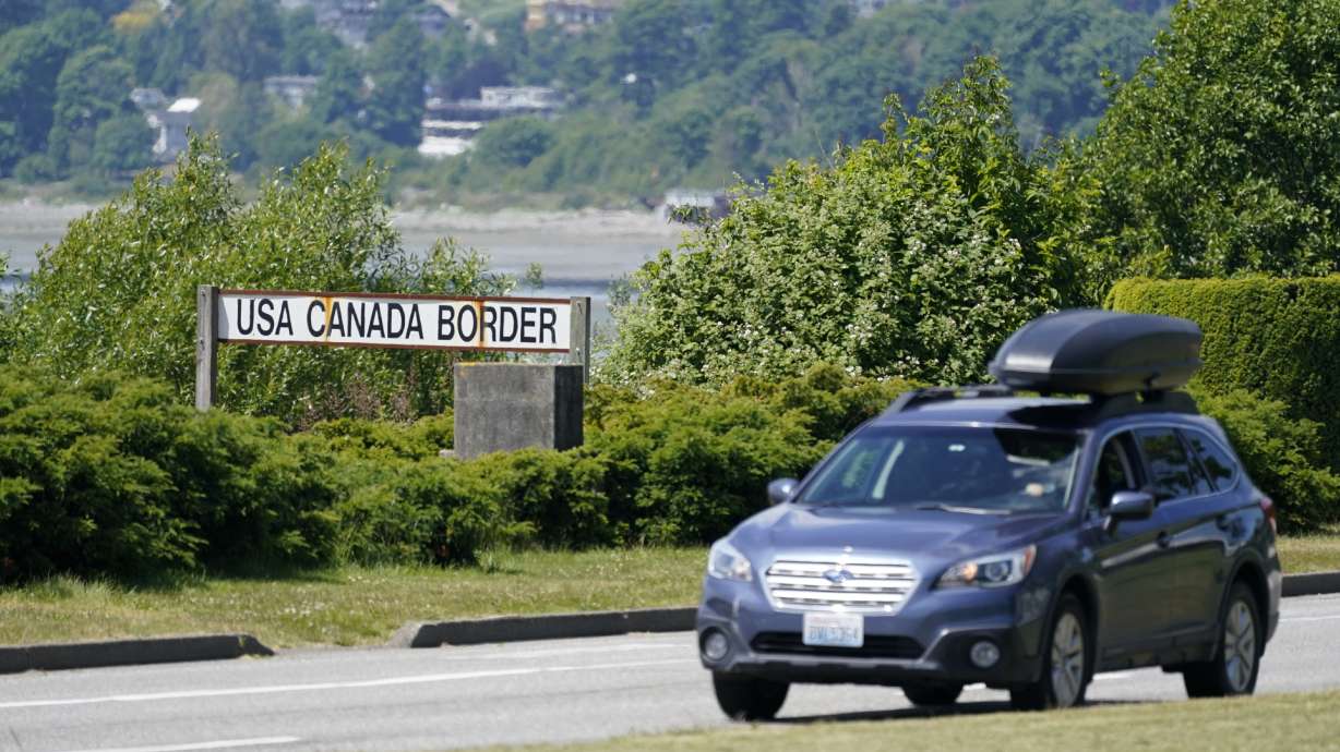 A car heads into the U.S. from Canada in Blaine, Wash. June 8, 2021. Canada is lifting its prohibition Monday on Americans crossing the border.