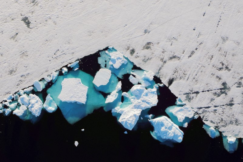 An iceberg floats in a fjord near the town of Tasiilaq, Greenland, June 18, 2018.