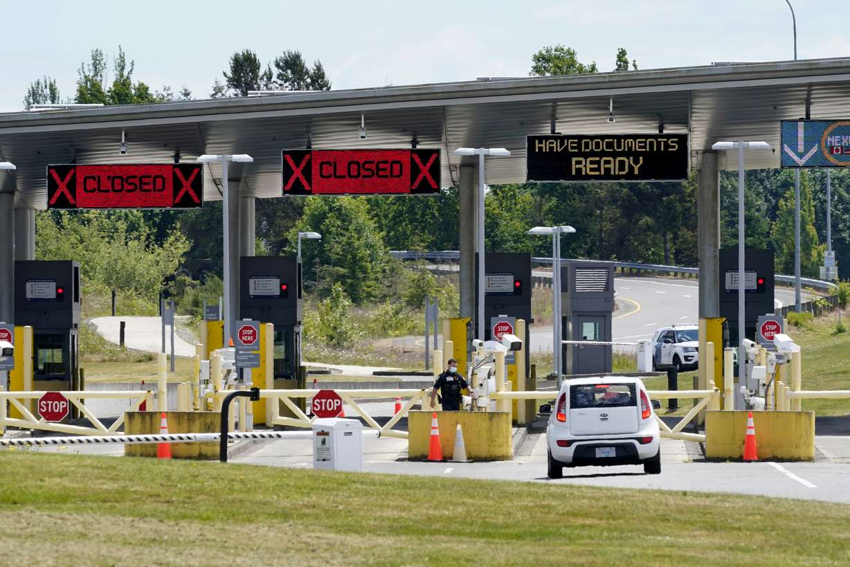 A car approaches the Peace Arch border crossing into the U.S. in Blaine, Wash. June 8, 2021.