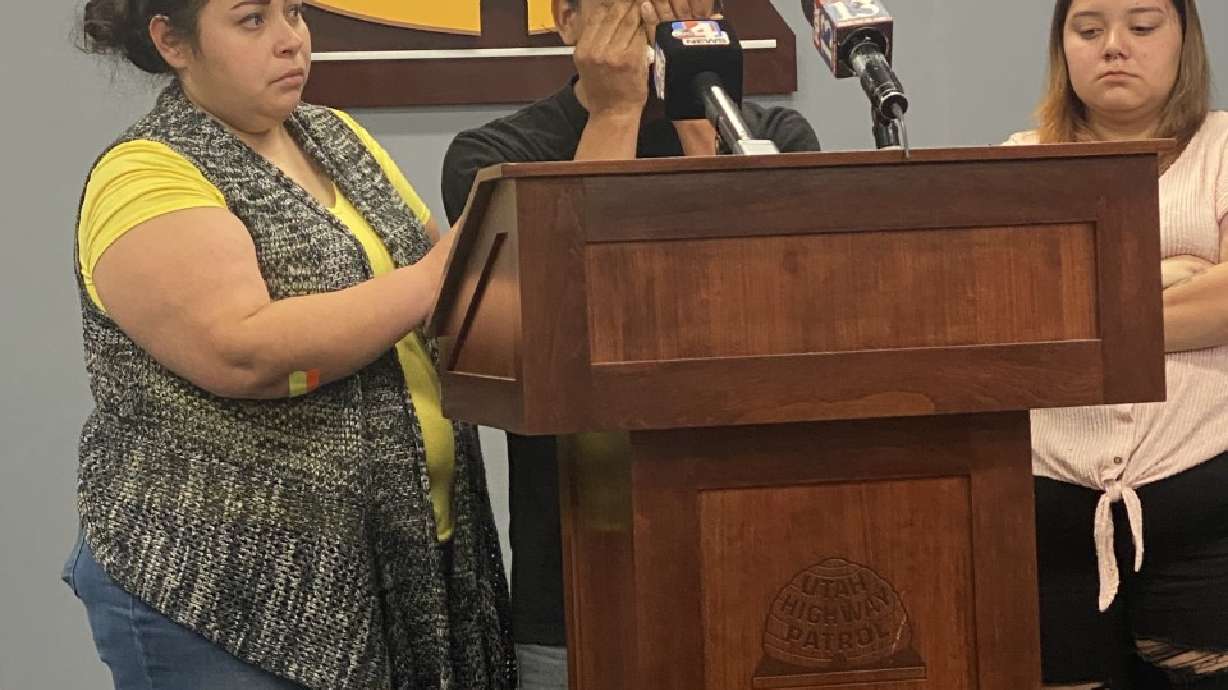 Rachel Vigil, left, consoles an emotional Tenzing Dhondup as he discusses how his bride of only seven hours was hit and killed on I-15 by a wrong-way driver while Marisol Demorst, right, looks on. Jelly Jimenez, 26, was one of six people killed in five crashes on Utah's highways over the weekend. Jimenez's niece was also in the car but survived.