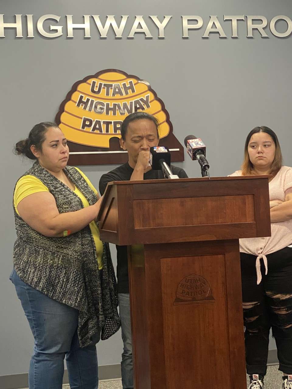 Rachel Vigil, left, consoles an emotional Tenzing Dhondup as he discusses how his bride of only seven hours was hit and killed on I-15 by a wrong-way driver while Marisol Demorst, right, looks on. Jelly Jimenez, 26, was one of six people killed in five crashes on Utah's highways over the weekend. Jimenez's niece was also in the car but survived.